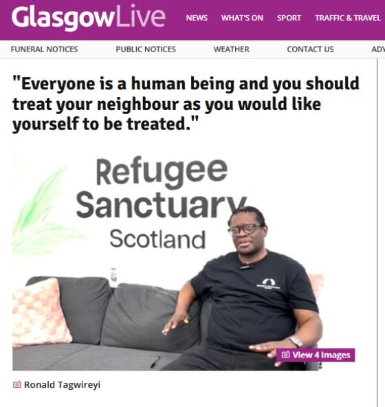 Ronald at the office getting interviewed by Glasgow Live
